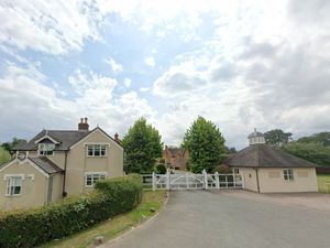 Supporting image for story: Firefighters tackle blaze involving car and electric gates at exclusive gated estate in Shropshire village