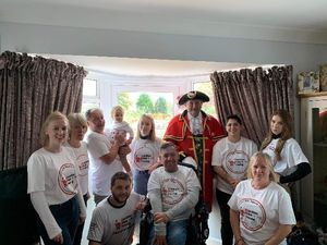 Katie's family with town crier Geoff Russell