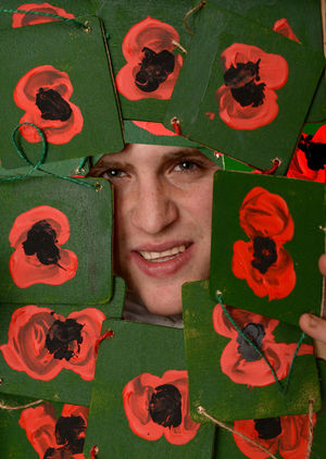 Charlie Teague with his poppy plaques..