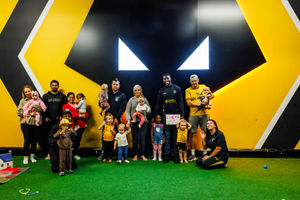 Healthy Goals team face the camera with Marshall Munetsi!