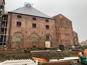 The scaffolding which had surrounded the pyramid-roofed Kiln at Shrewsbury Flaxmill Maltings since March 2019 has been removed