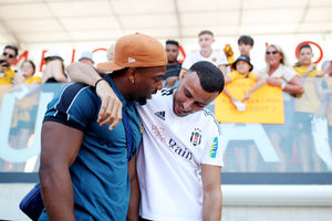 Adama Traore with old team mate Romain Saiss (Getty)
