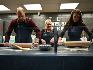 The Prince and Princess of Wales help prepare and cook a batch of Welsh cakes