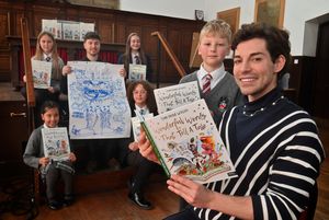 Tom Read Wilson and his Illustrator: Ian Morris were there to talk about there new book, to an audience of pupils from a number of different schools. Front is Tom and Grammar Schools: Kit Baldwin 9, At the back are pupils: Jasmine Midha 8, and Lola Moore 13 from the Grammar School, and Gabija Santaraite 10 from Bantock Primary School and Anais Broadhurst 11 from Perton Middle School.