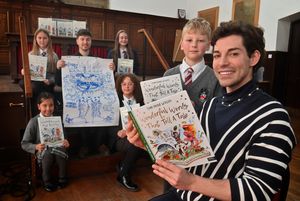 Tom Read Wilson and his Illustrator: Ian Morris were there to talk about there new book, to an audience of pupils from a number of different schools.  Front is Tom and Grammar Schools: Kit Baldwin 9, At the back are pupils: Jasmine Midha 8,  and Lola Moore 13 from the Grammar School, and Gabija Santaraite 10 from Bantock Primary School and Anais Broadhurst 11 from Perton Middle School.