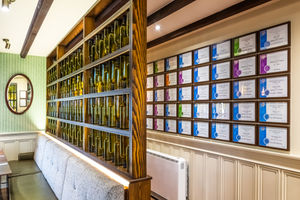 A striking wine bottle installation forms a signature feature of the revamped restaurant at Halfpenny Green Wine Estate