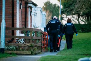 Police prepare to raid a property in Brookside, Telford