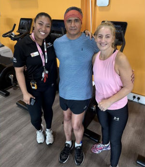 Madan, with Kelly and Naomi, back in the gym. 