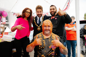  Ian Jones with, Tina Patel, Mayor of Dawley Ian Preece and Jagtar Koritana outside the Premier Store in Dawley