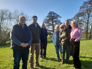 From left: Councillor Peter Richardson, Chris Roberts, Councillor Andy Davis, Margaret Jones, Carol Richardson, Councillor Iain Campbell, and Linda Rickards are concerned about a proposed project that could see electric pylons being built, including