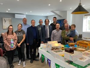 Supporting image for story: MP learns about Blackheath business during Macmillan Coffee Morning.