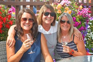 Cooling down at the Old Castle pub were, from left: Jo Haddon, Clare Green and Faye Thomas. Photo: Tim Sturgess