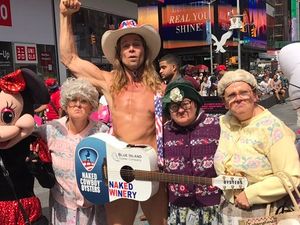 Supporting image for story: Black Country comedy troupe The Fizzogs dance with The Naked Cowboy in New York - with video