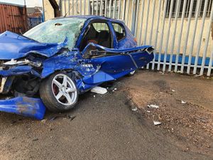 Supporting image for story: Driver suffers head trauma in crash with skip wagon