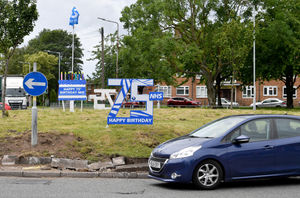 The traffic island has been decorated to celebrate 75 years of the NHS