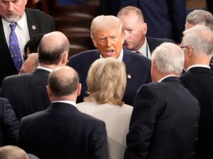 President Donald Trump departs after addressing a joint session of Congress