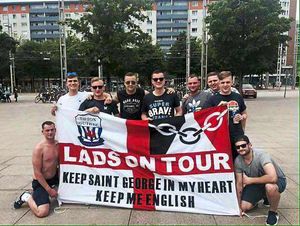 Ashley Kelly, on the left kneeling, with fellow England supporters and friends