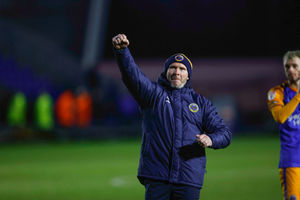 Michael Appleton celebrates after Shrewsbury Town's win over Harrogate Town