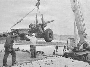 Artillery guns being installed at the Donnington Garrison roundabout on Thursday, January 10, 1985. The caption was: 'The Army at COD Donnington yesterday handed over three 5.5in field guns to Telford Development Corporation to be positioned on the traffic island opposite the depot entrance. The guns have been refurbished and made safe by the garrison and were presented to the corporation by Brigadier H R Higgins...'