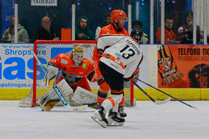Tigers man of the match Harry Ferguson gets an effort away. Pic: Edward Bowen / ebphotography