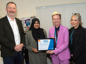 Supporting image for story: 'A massive surprise': Hospital booking clerk honoured for 'outstanding' commitment to patient care