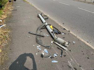 Supporting image for story: Photos show remains of smashed traffic lights strewn on ground at major Telford road island