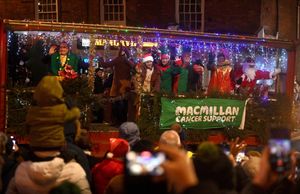 Bridgnorth Christmas Tractor Run as it passes Bridgnorth High Street.