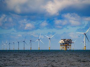 A row of turbines in offshore wind farm