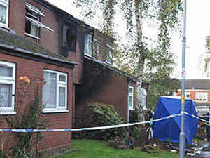 Supporting image for story: Five rescued from flats fire