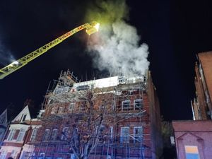Supporting image for story: Around 100 firefighters tackling takeaway, flat blaze