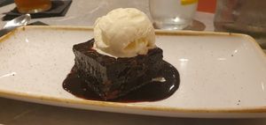 The ice cream helps to balance the flavours of the dessert