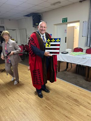 Mayor Tim Manton was presented with the Pézenas coat of arms