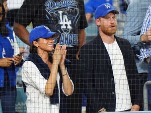 Supporting image for story: Harry and Meghan cheer on the Los Angeles Dodgers from front row seats