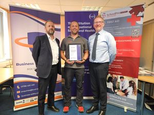 Neil Shotton (left), CEO of Business Safety Systems, Jamie Bartlam, IOSH Level 6 graduate, and Mike Smith, Head of IOSH Awarding Organisation