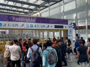 Passengers at Paddington station in London, after London Underground services were suspended because of power failures
