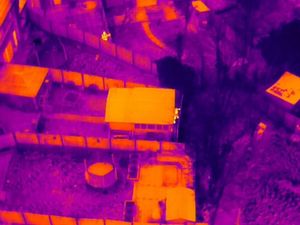 Supporting image for story: Police drone images help spot suspected burglar hiding behind shed