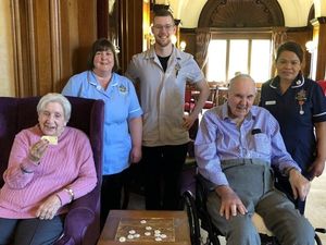 Residents and staff with the new badges, from left: Joan Ringwood, Nicola Dudleston, Harrison Davies, John Webster and Jean Julian