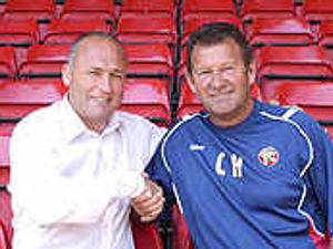 Supporting image for story: New scout reunited with Hutchings