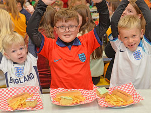 Supporting image for story: Students chow down on football inspired school lunch