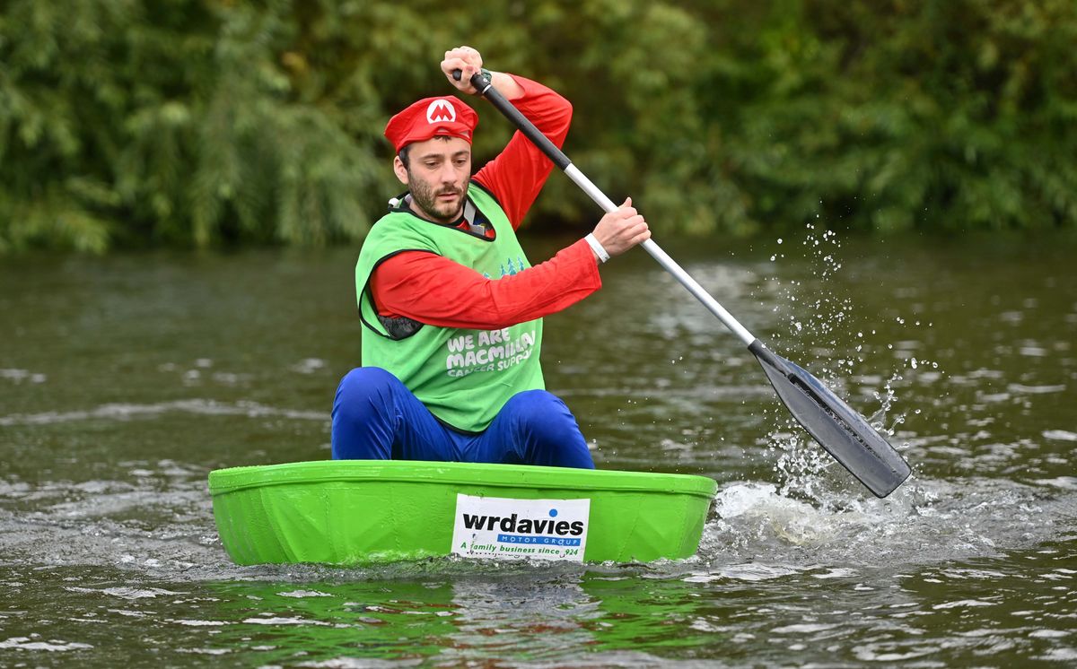 29 pictures of boats capsizing and wacky racing as Super Mario, pirates and octopuses take part in Shrewsburys Coracle World Championships