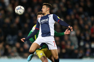  Callum Robinson of West Bromwich Albion and Ryan Ledson of Preston North End during the Sky Bet Championship match between West Bromwich Albion and Preston North End at The Hawthorns on January 26, 2022 in West Bromwich, England. (Photo by Adam Fradgley/West Bromwich Albion FC via Getty Images).