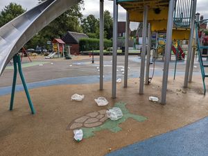 The milk on the special safety surfacing at the park