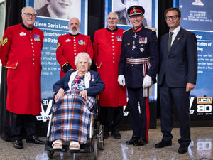 99-year-old Eileen Lavery, who signed up as a WREN during WWII, with Chelsea Pensioners Barry Prior, Ted Fell and Mick Skerrat, Lord-Lieutenant of Staffordshire Sir Ian Dudson CBE and JCB deputy chairman George Bamford during a VE Day event at JCB's World Headquarters in Rocester, Staffordshire.