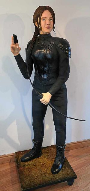 Lara Clarke's amazing cake of Jennifer Lawrence as Katniss.