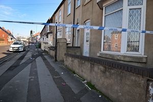 Part of the road remains cordoned off while police continue their investigation