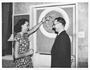 Darts match with the Wolverhampton Tilburg Committee. The photograph shows Mary-Jes-Van Ierlant with Mr S C Bailey. Date stamp 7 August 1948
