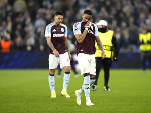 Aston Villa’s Ezri Konsa, right, and Morgan Rogers look dejected following defeat to Paris St Germain
