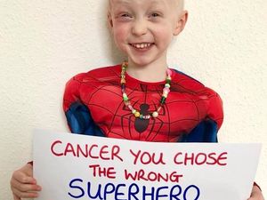 Supporting image for story: Superhero Oscar celebrates last day of cancer treatment