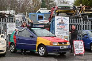 Volkamgic's Lee Southerton hands over the keys to Nessy the Car to the 'Santa is a Gangsta' competiton winner: Jane Davies from Penn.