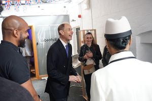 The Duke shares a joke with volunteers and students at Beatsabar